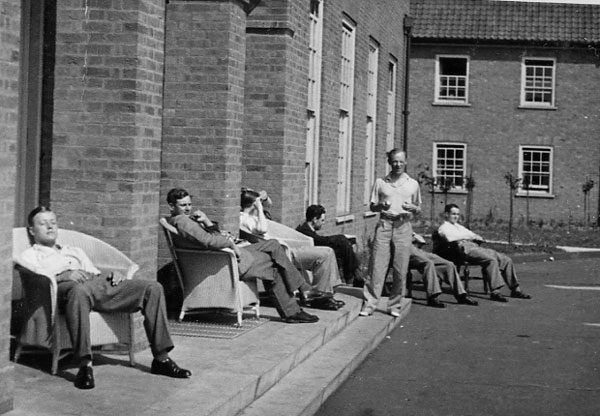 Officers of 21 Squadron relaxing outside the Officers Mess at Watton. This is probably September 1939 and comes from the personal album of Hugh Dunford-Wood who was killed on ops over Dunkirk