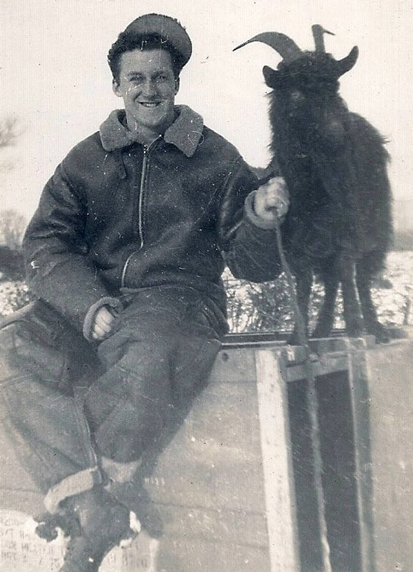 Ray Dorman from Weymouth, Massachusetts and a goat kept on the station