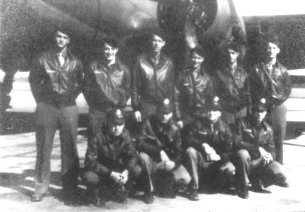 Raymond and crew at RAF Watton 1944. Front row right to left: Pilot Raymond Stephenson, Co-Pilot Joseph Ward, Navigator Eugene Swiatnicki, unidentified. Back row left to right: Engineer Eral Westerholm, Gunner Leonard Licurse, Radio Operator Joseph Minery, Gunner Keith Clinton, two unidentified.